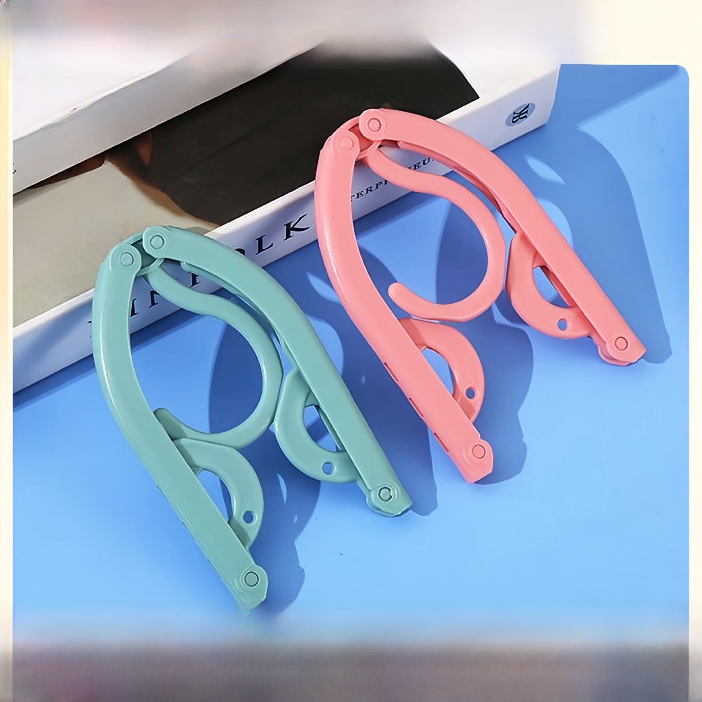 Multifunctional foldable clothes hanger